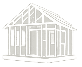 Framing structure of a house under construction with wooden beams and framework.